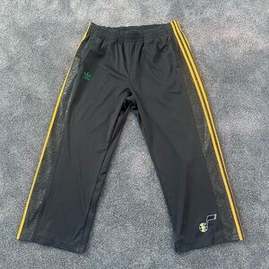 Adidas Black Track Pants with Yellow Stripes